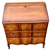 Secretary desk called "scriban" in Louis XV style made of fruitwood.