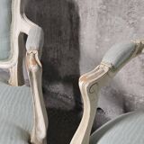 Pair of Louis XV style armchairs in patinated wood, light blue fabric.