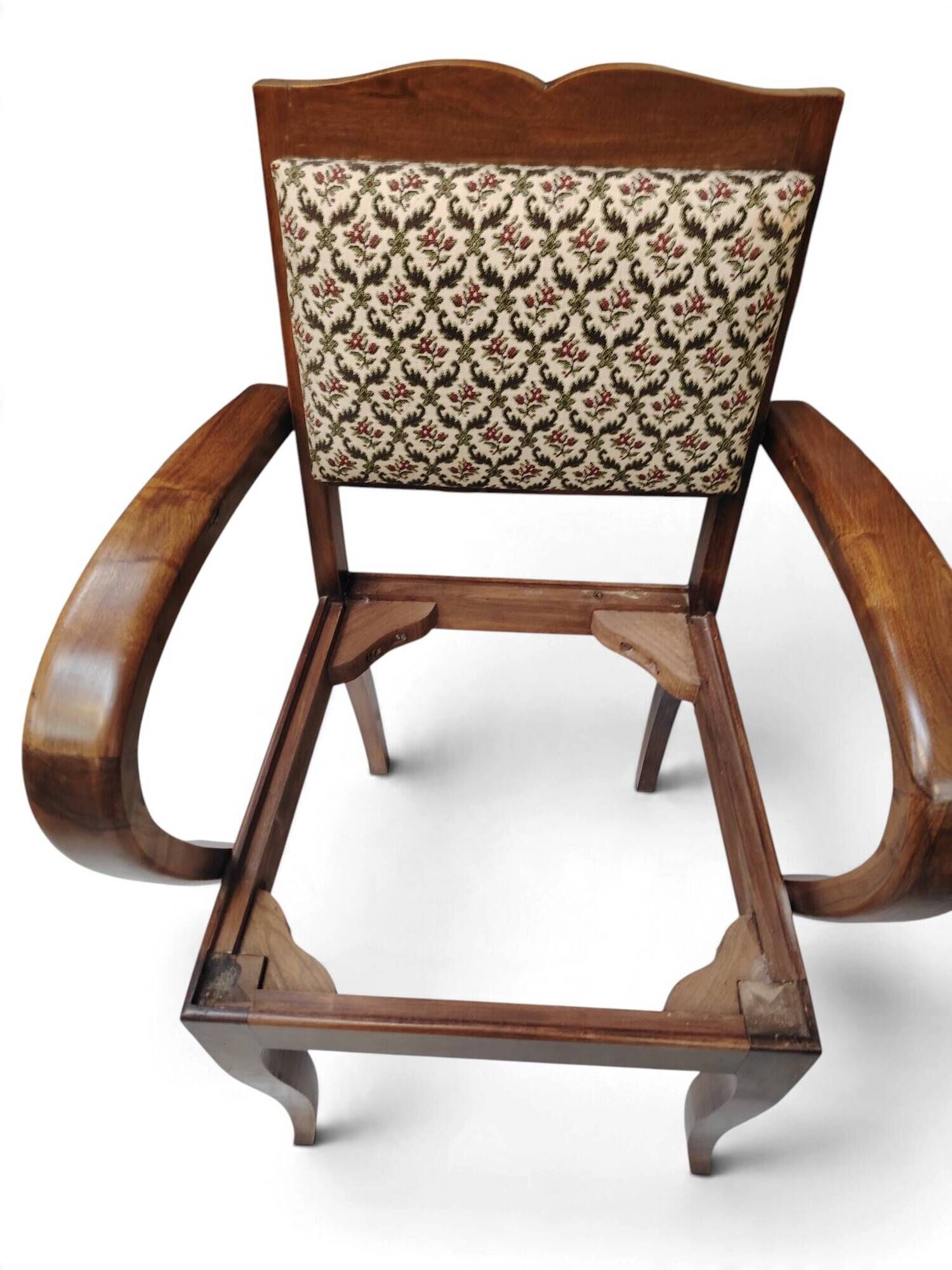 Art Deco armchair with a moustache backrest and curved armrests from the 1930s.