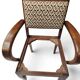 Art Deco armchair with a moustache backrest and curved armrests from the 1930s.