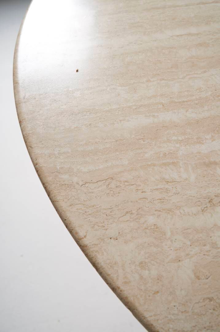 Round travertine dining table