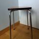 Chrome metal and orange formica stool