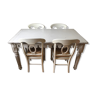 Table with solid wooden scallops and 4 chairs