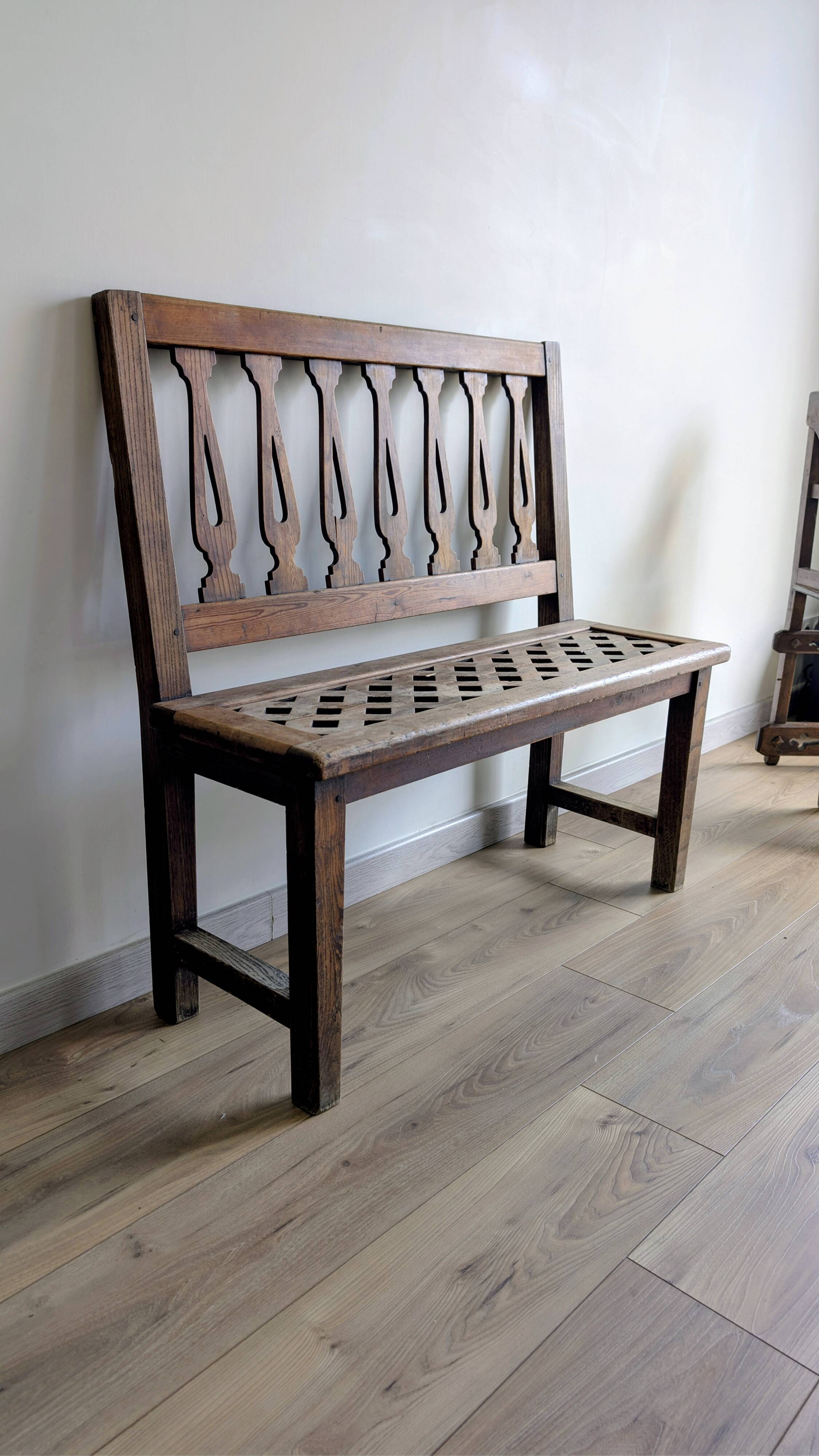 Old church bench in pitch pine, rustic charm and authentic patina.