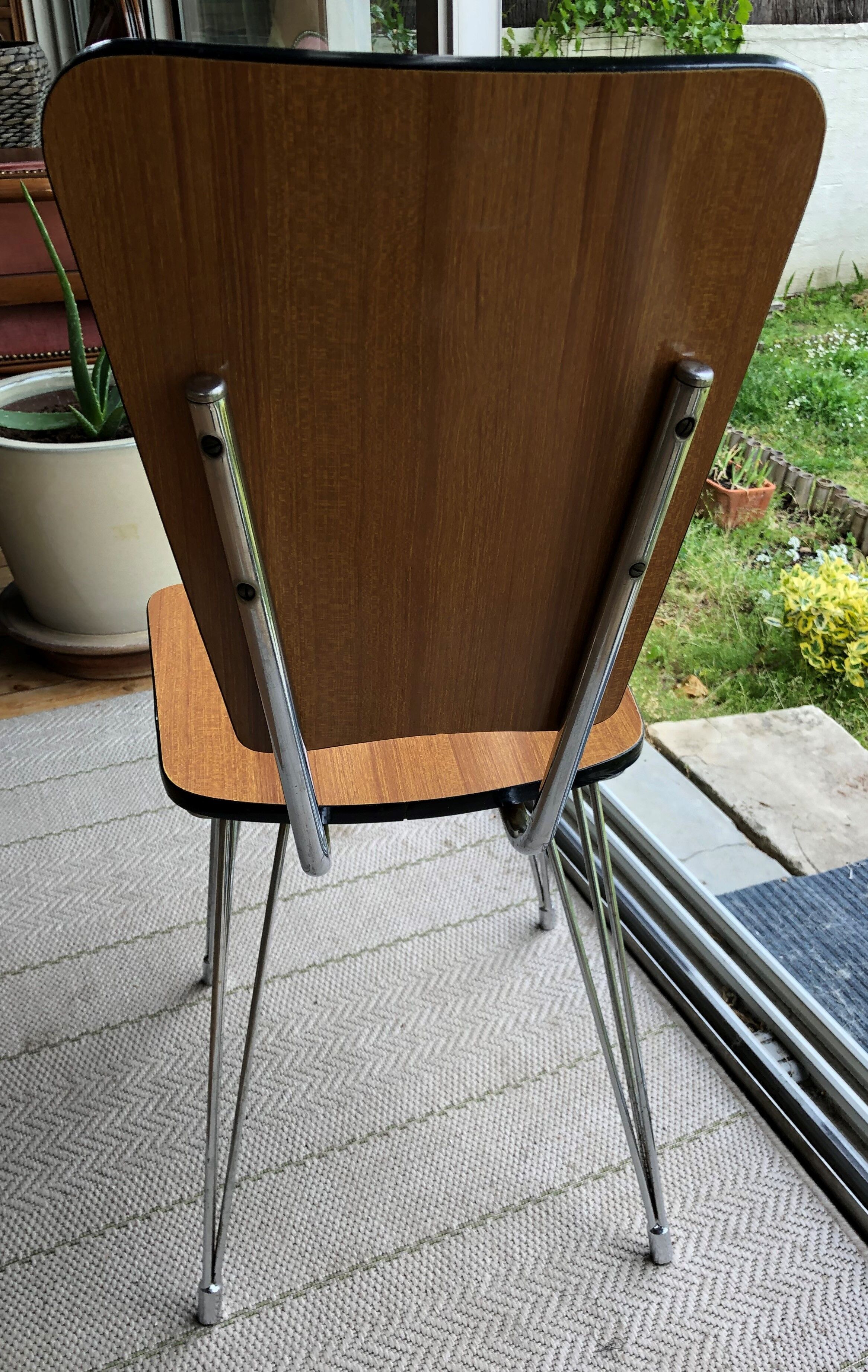 Duo of chairs in formica imitation brown wood and eiffel feet