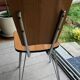 Duo de chaises en formica imitation bois marron et pieds eiffel