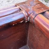 Rattan and bamboo bed and side tables