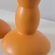 2 orange ceramic candle holders