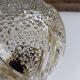 Round relief luminaire glass RZB and its electrifiable support.