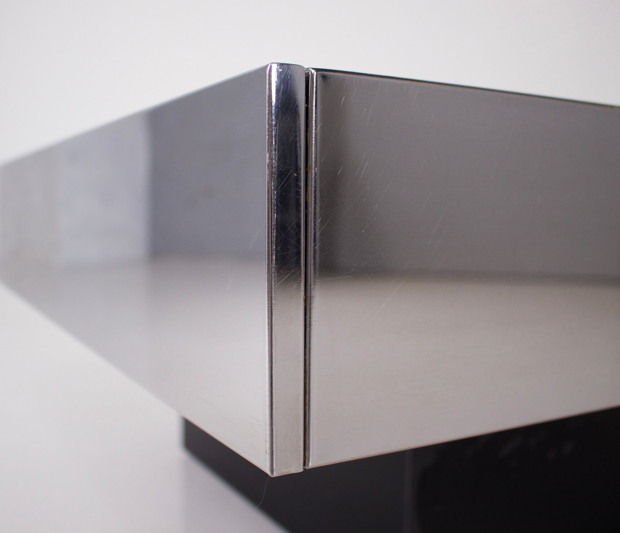 Opening coffee table in bar, Rizzo & Cidue 1970.