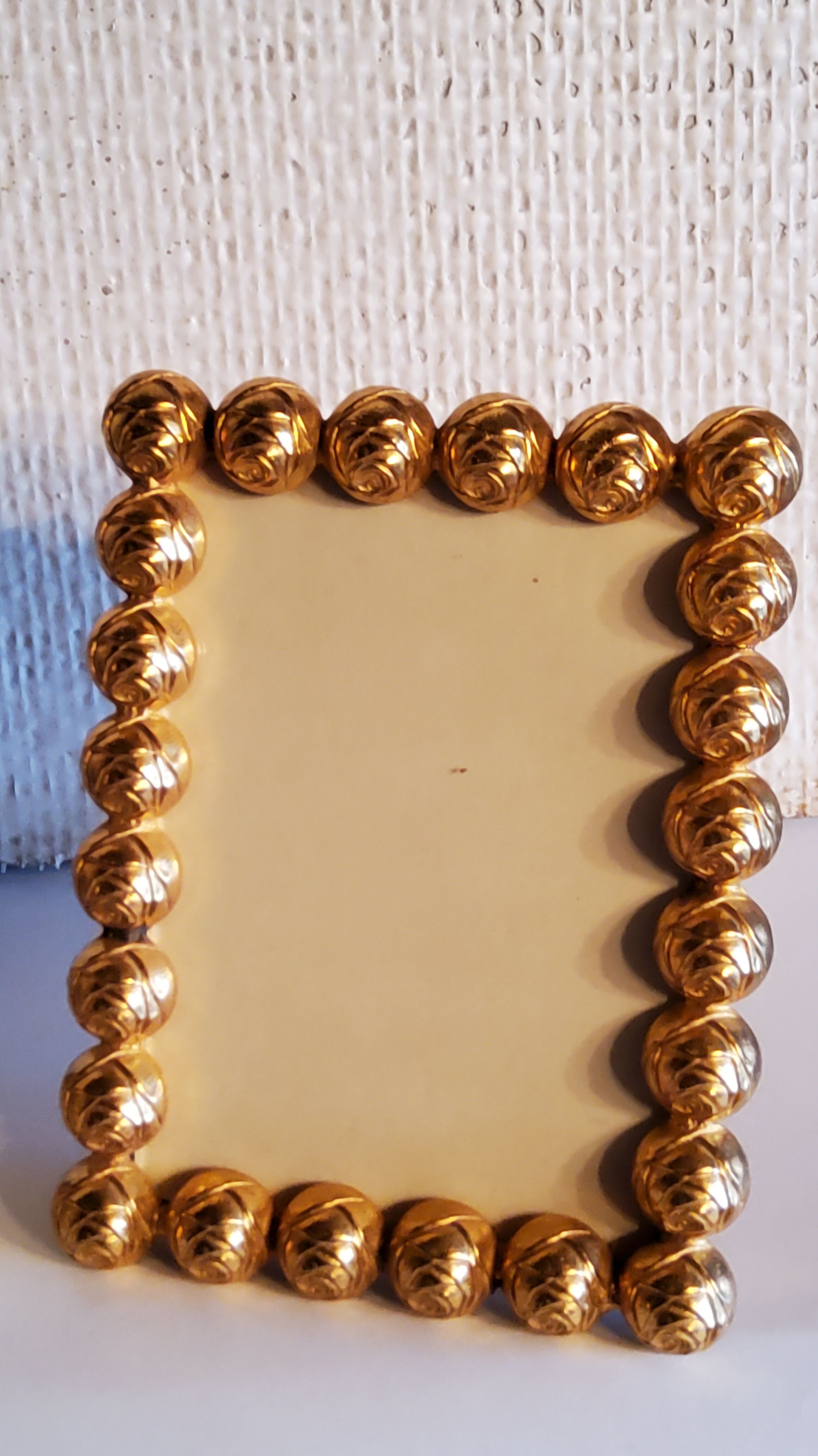 Pair of art deco photo frames in gilded bronze and gilded brass