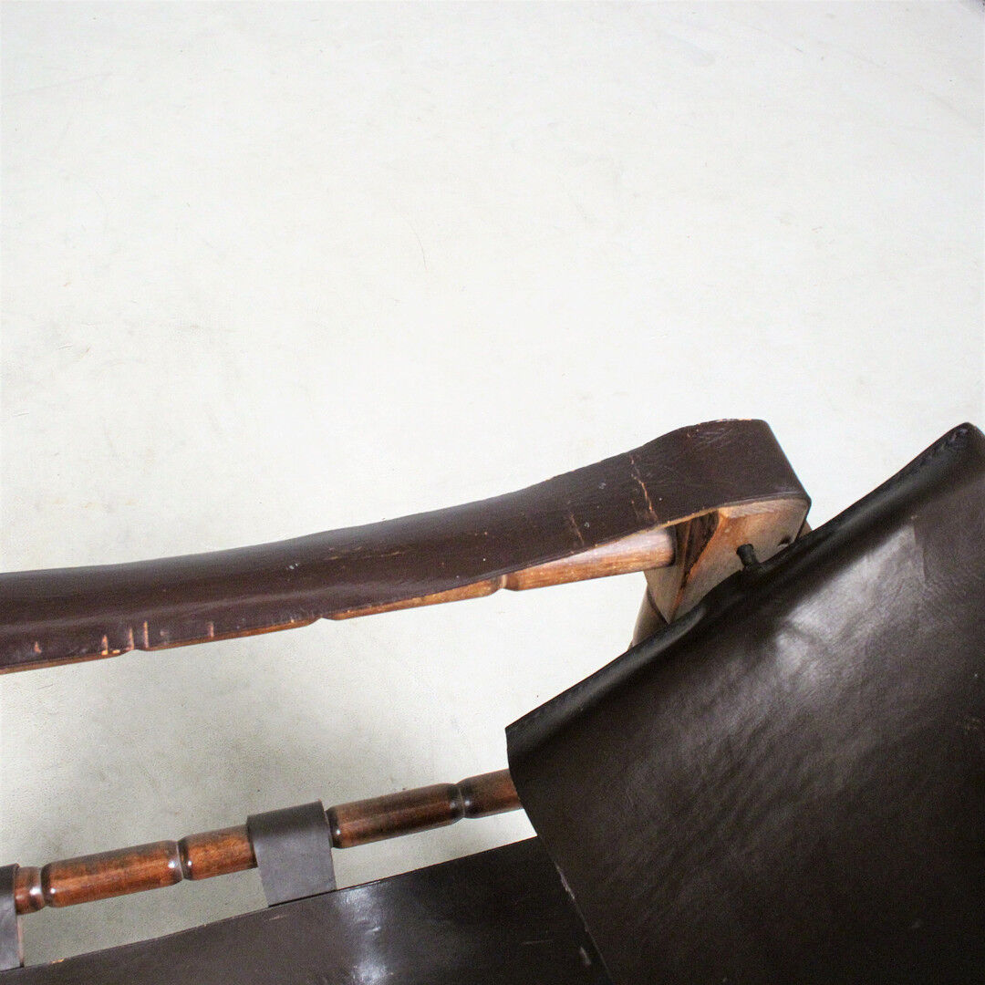 Pairs of vintage Safari style armchairs in wood and leather