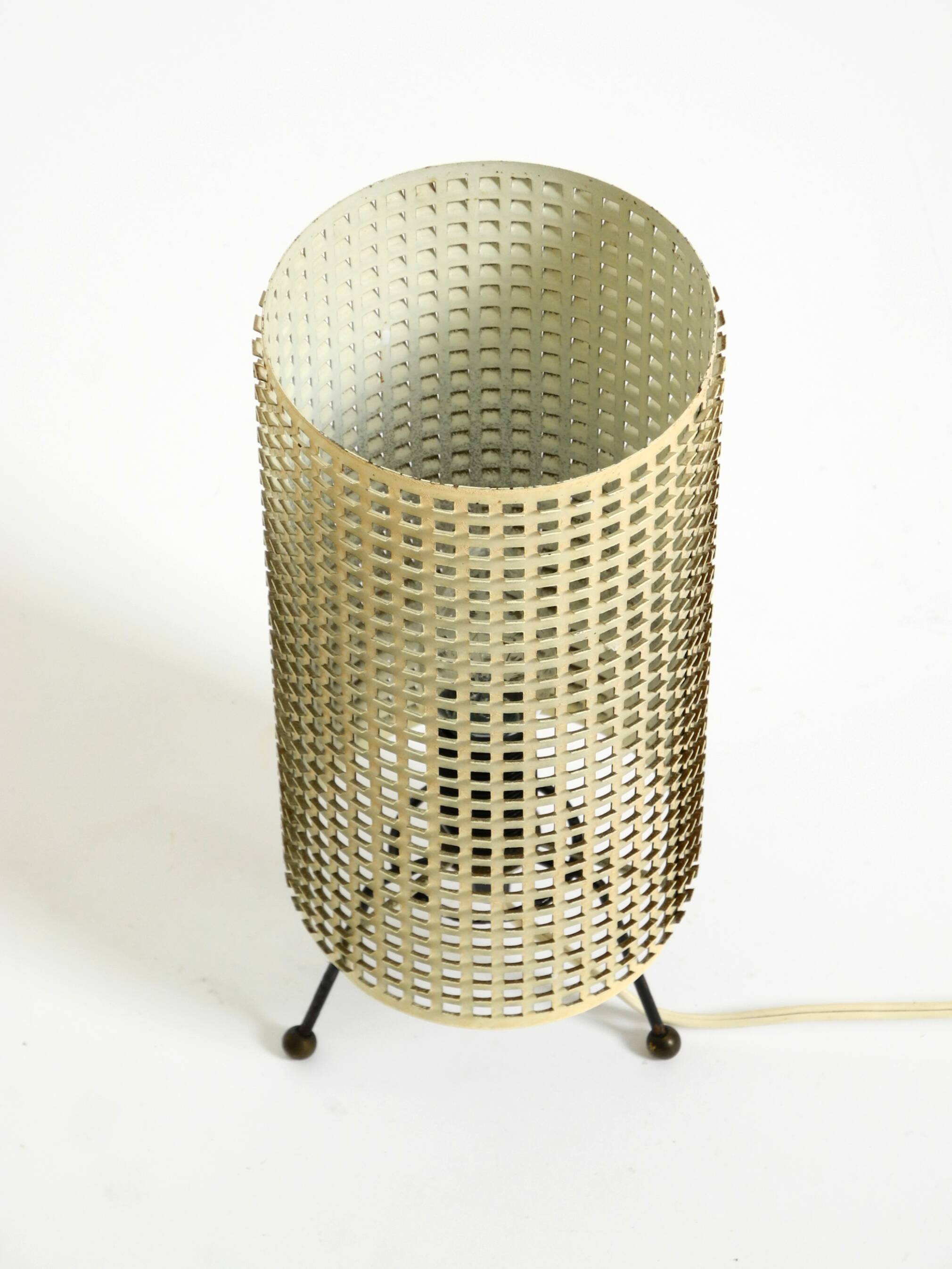 Original 1950s brass tripod table lamp with a perforated metal lampshade