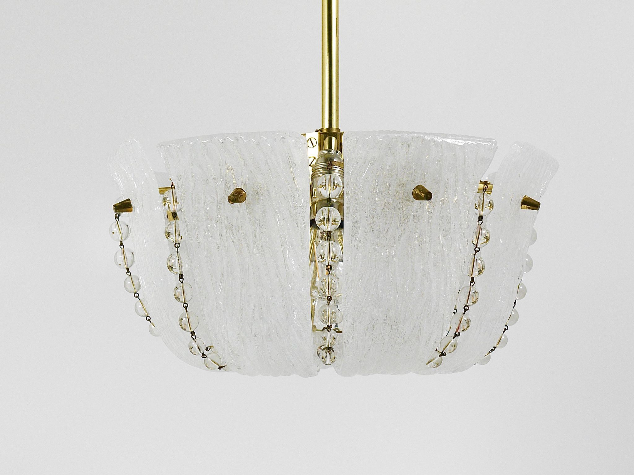 J.T. Kalmar Petite curved suspension basket, brass and glass, Austria, 1950s