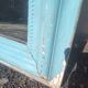 Large Louis-Philippe mirror from the 19th century in wood and stucco with a turquoise blue patina.