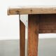 Antique pinewood coffee table with a drawer and a rural appearance