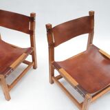 Pair of elm and leather heaters by Maison Regain, 1960s
