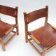 Paire de chauffeuses en orme et cuir par la Maison Regain, 1960s