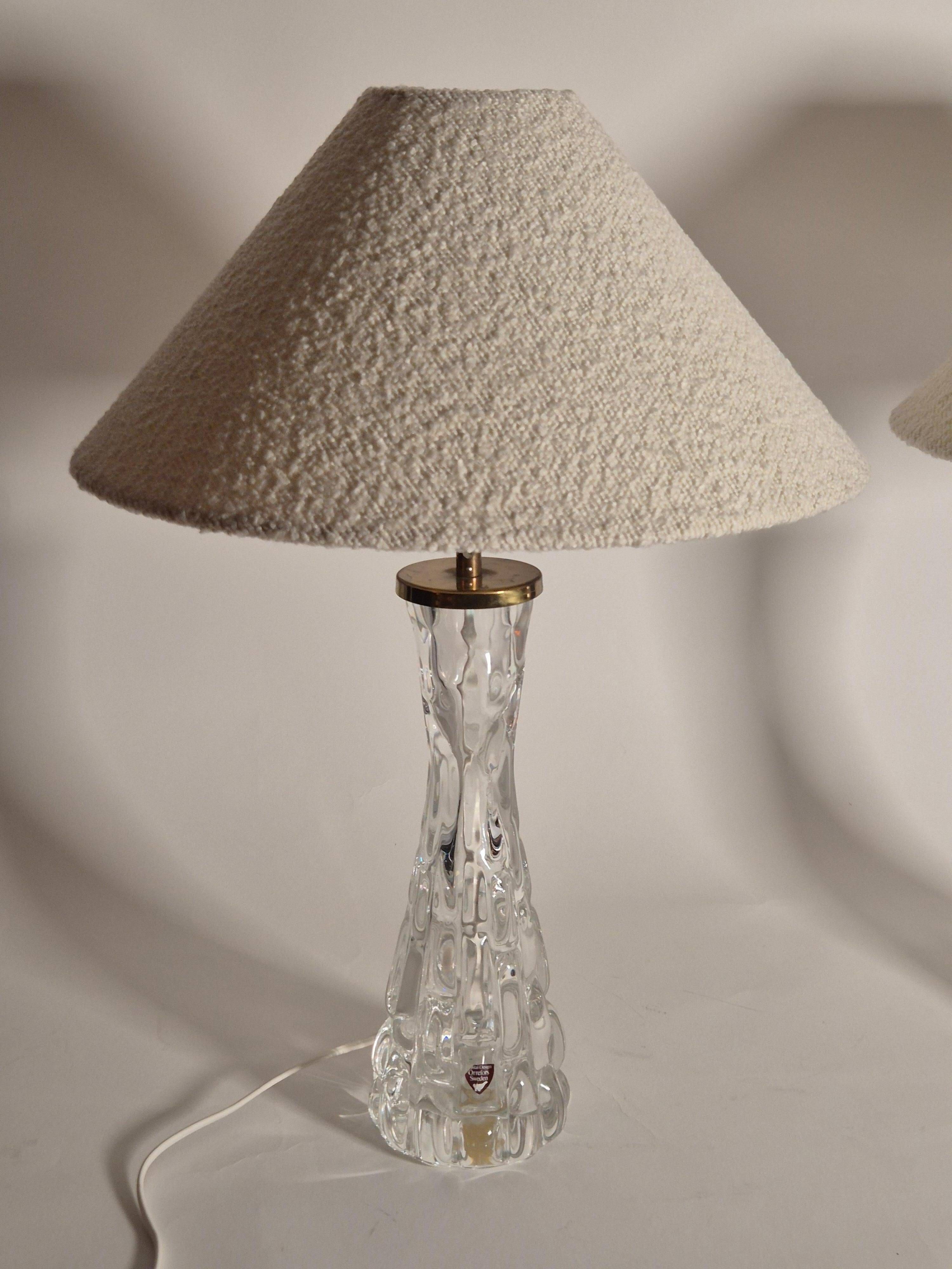 Elegant pair of table lamps The Modern Scandinavian Modern with Orrefors glass and brass.