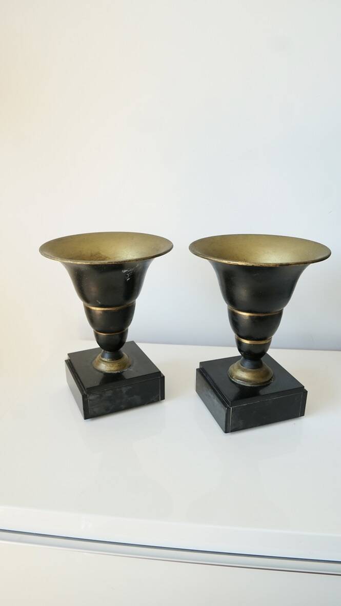 Pair of Art Deco enamelled brass casseroles, black and white marble base