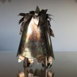 Owl in 1970s brutalist plate