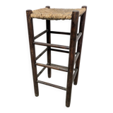 High stool made of wood and straw