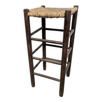 High stool made of wood and straw