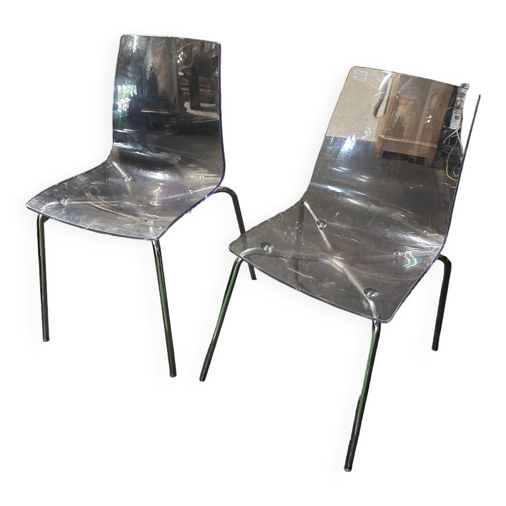 Pair of smoked polycarbonate chairs