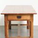 French dining table from the 18th century with a fruitwood top and oak base