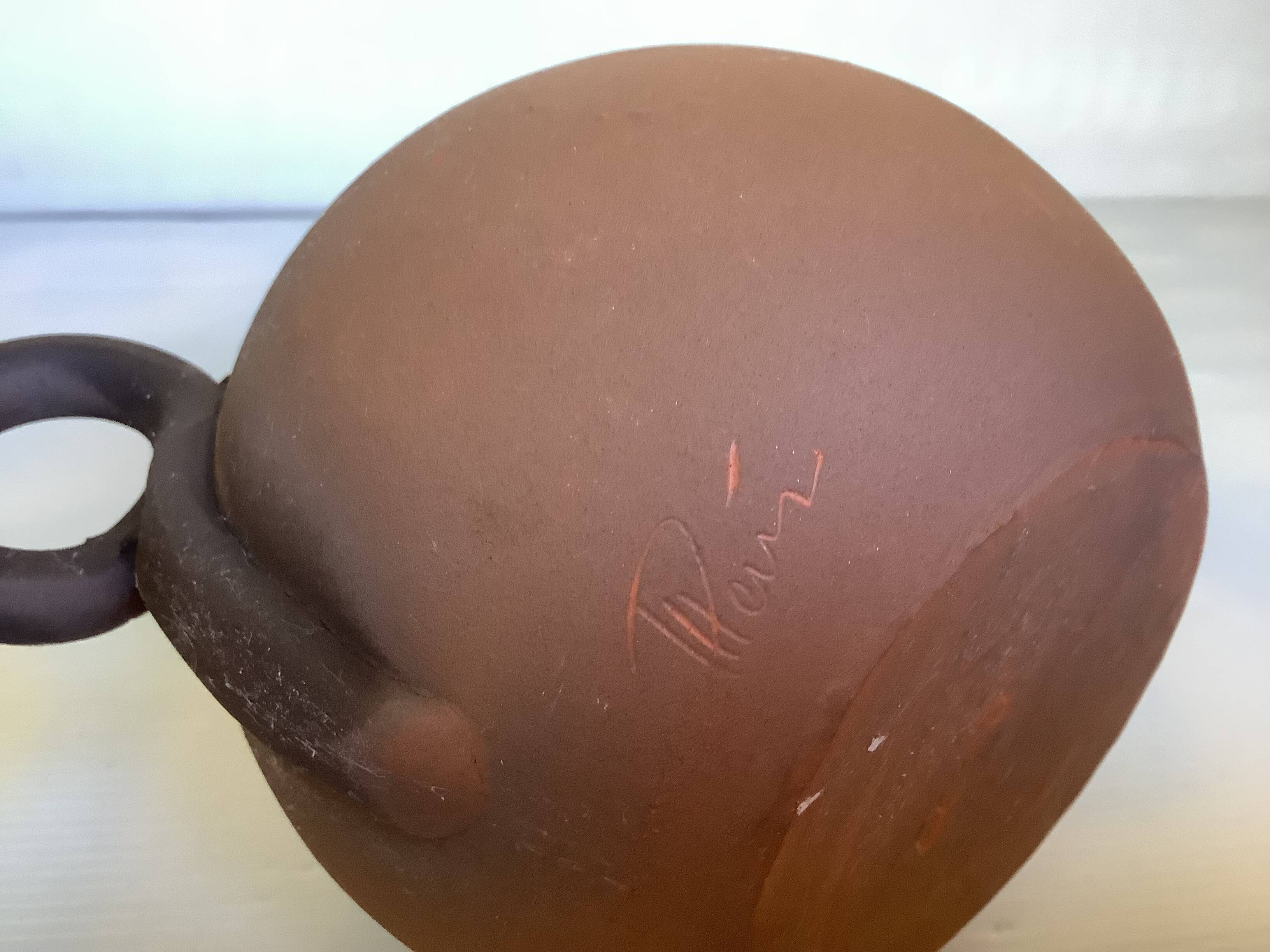 Signed terracotta vase