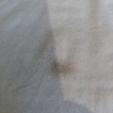 Wicker pouf with cushion