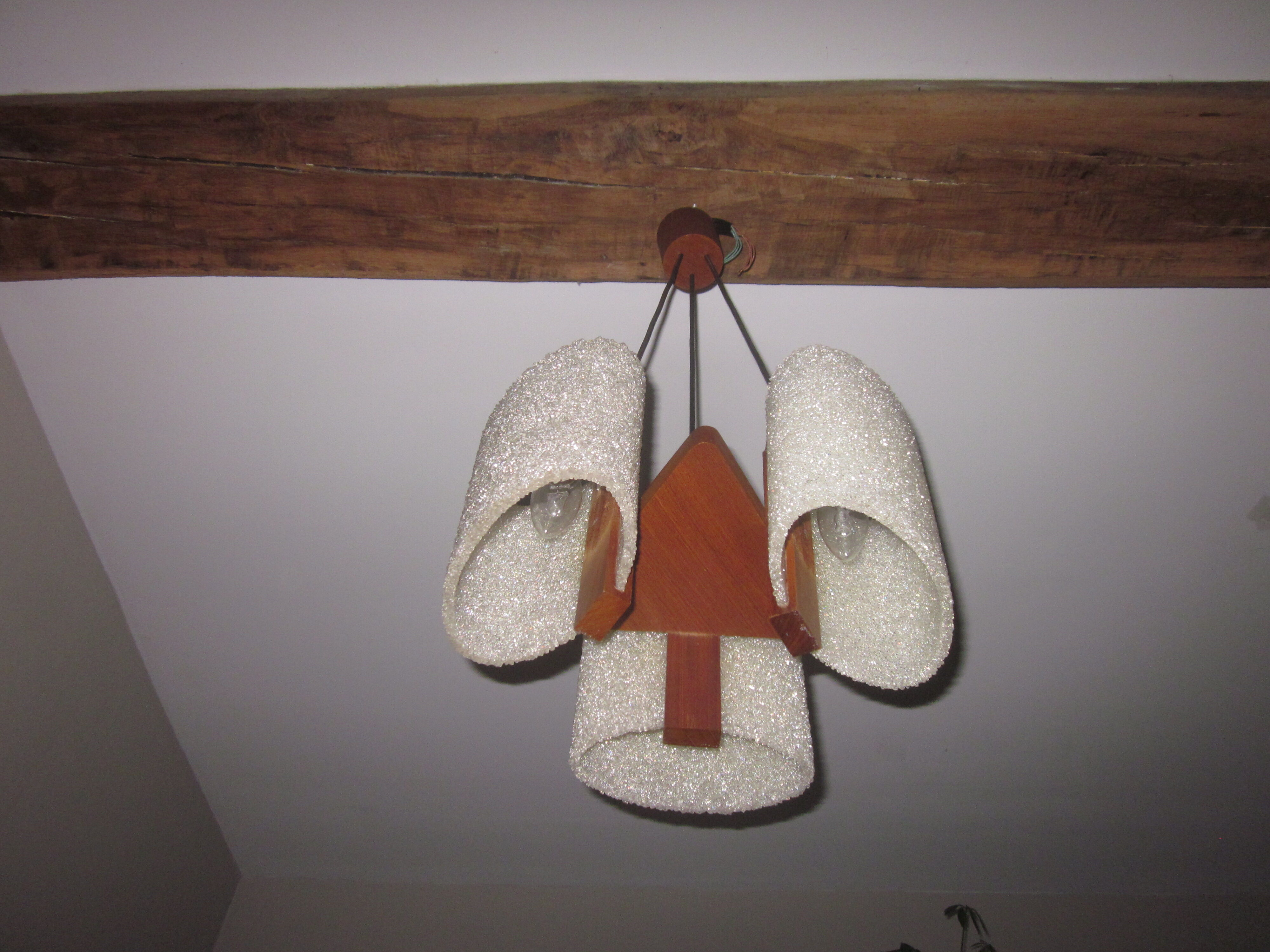 Scandinavian teak chandelier and perplexed