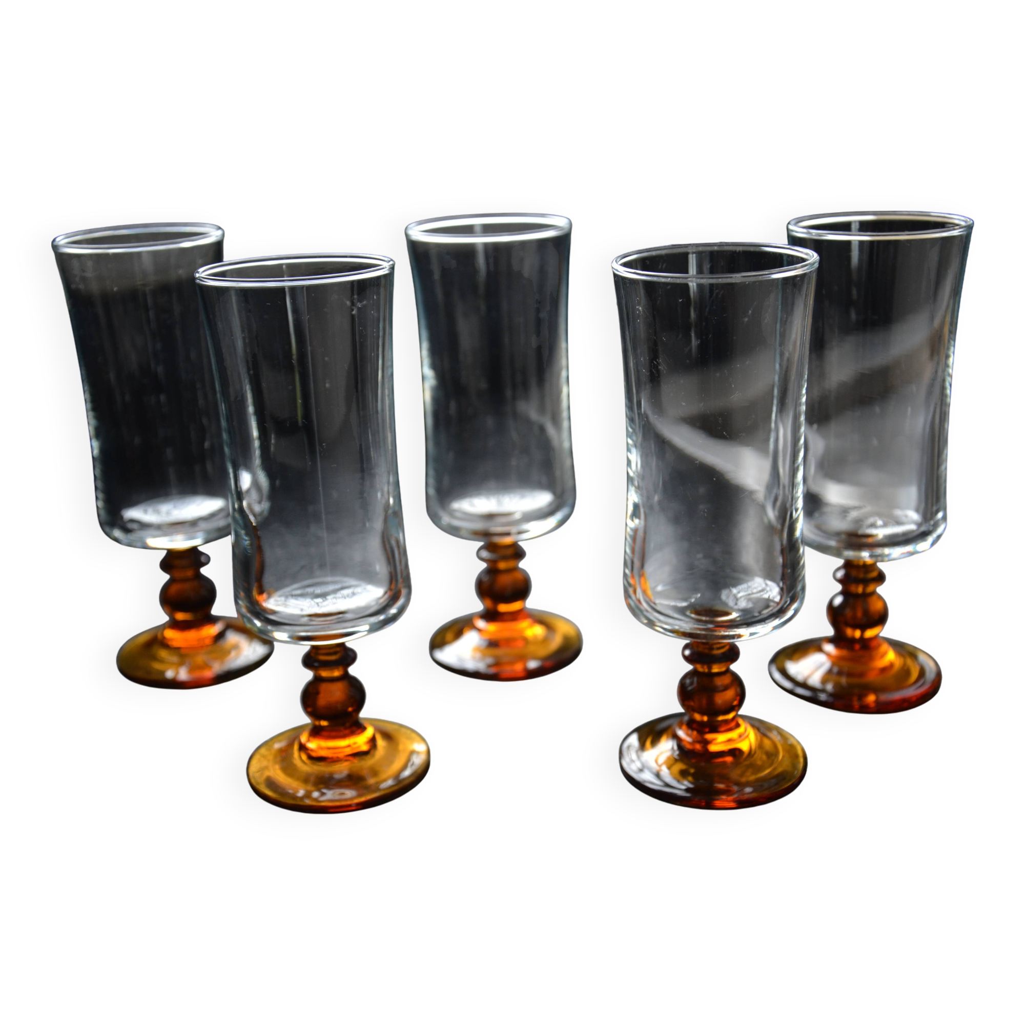 Champagne glasses with amber stems