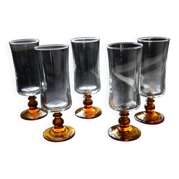Champagne glasses with amber stems