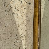 Golden mirror style Restoration decorated with stretched palmettes