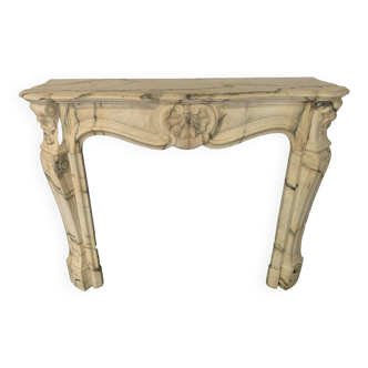 Louis XV style fireplace in 19th century veined breccia marble