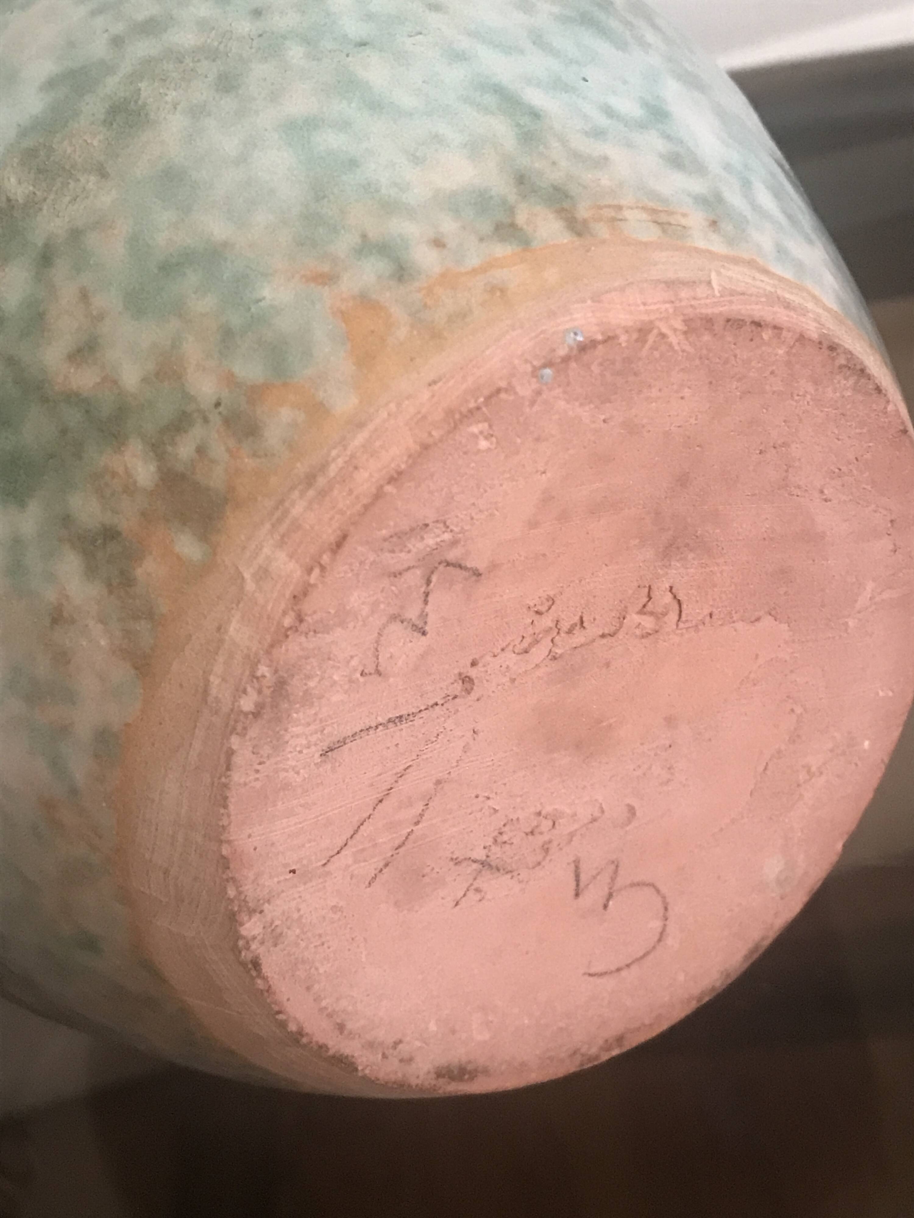 Antique turquoise terracotta vase