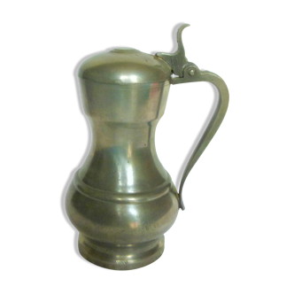 Closed tin pitcher