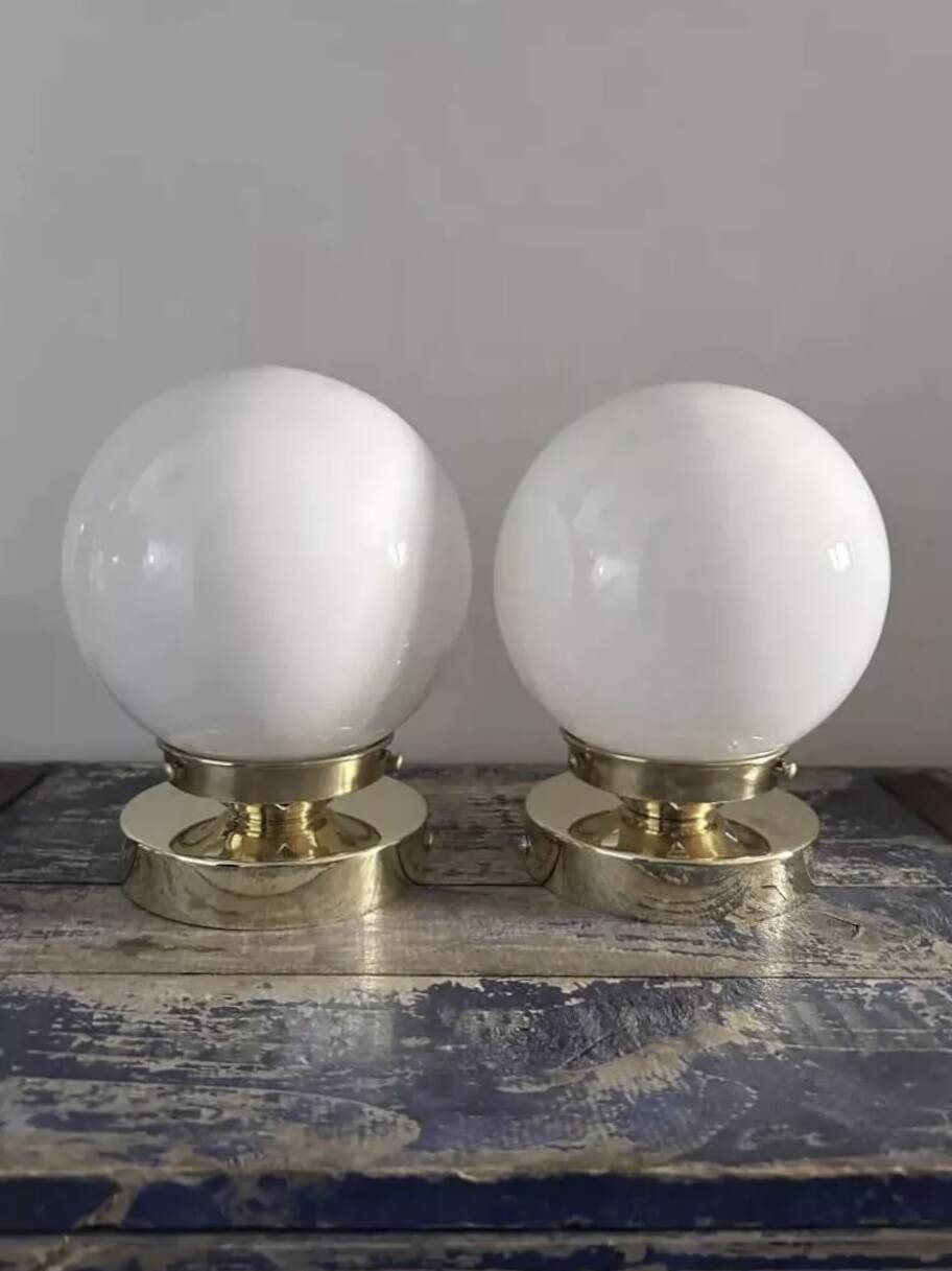 Pair of white opaline globe wall lights