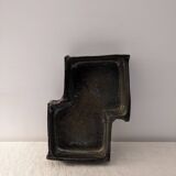 Ceramic pocket emptier