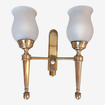 Neoclassical Torch two-arm wall lamp in solid brass, circa 1940