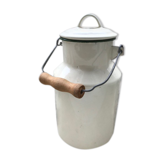 Vintage milk jar in ivory and green enamel