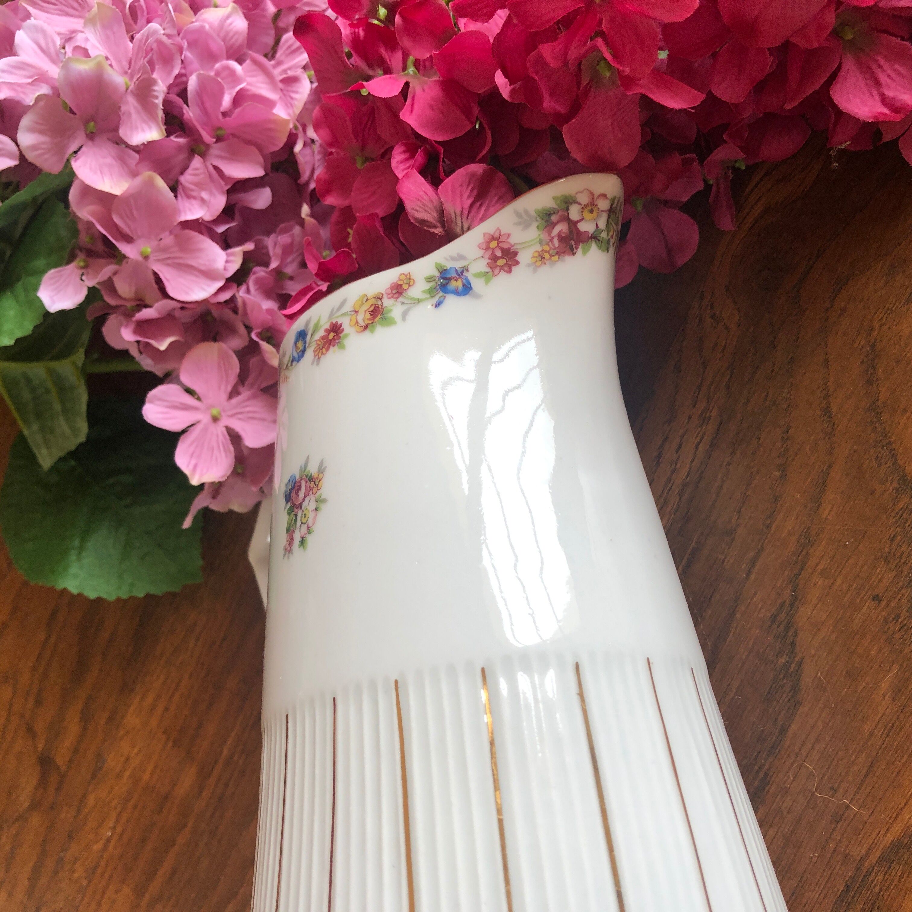 Porcelain pitcher with flowers