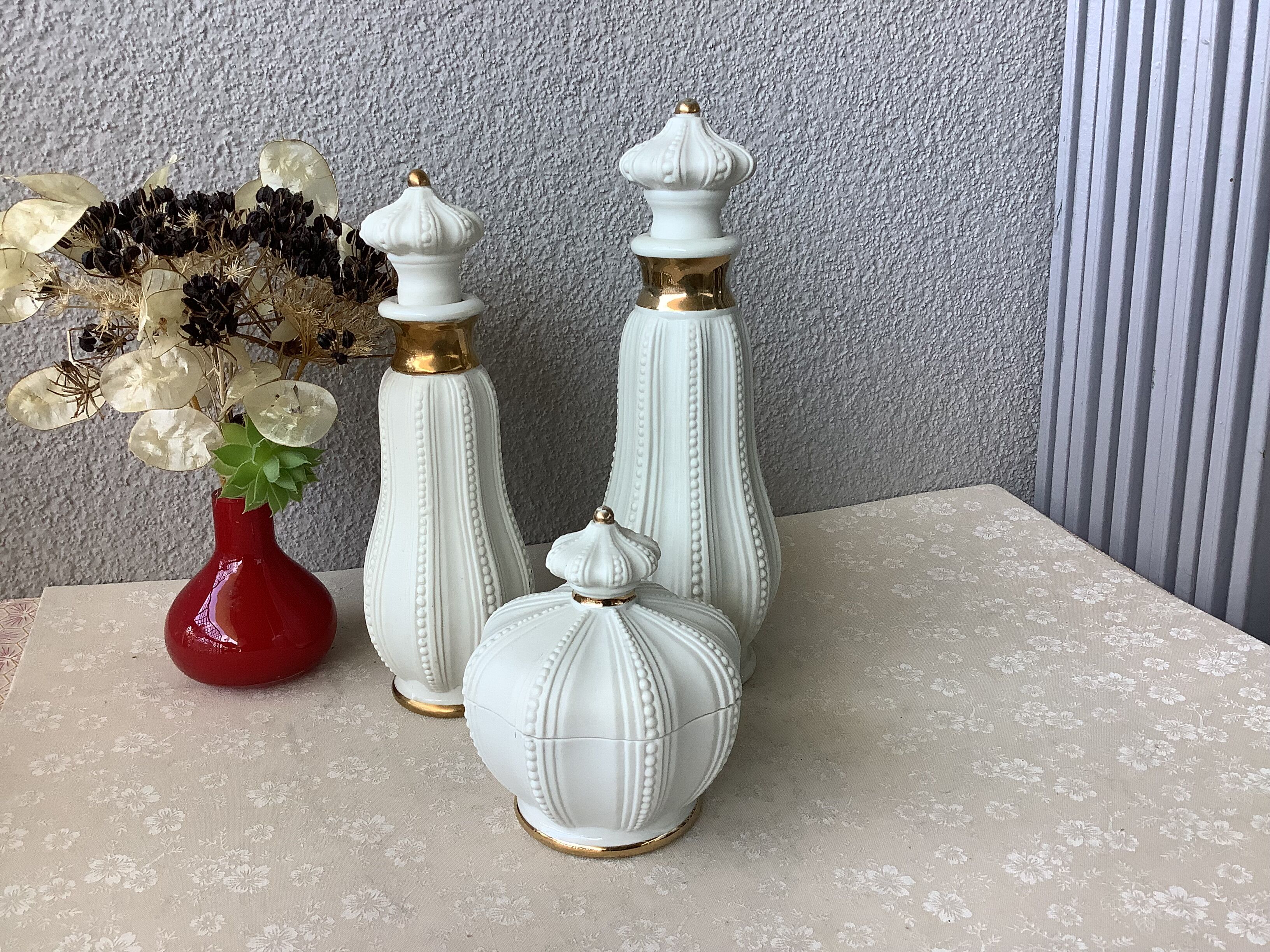 3 porcelain biscuit bottles from La Couleuvre art deco