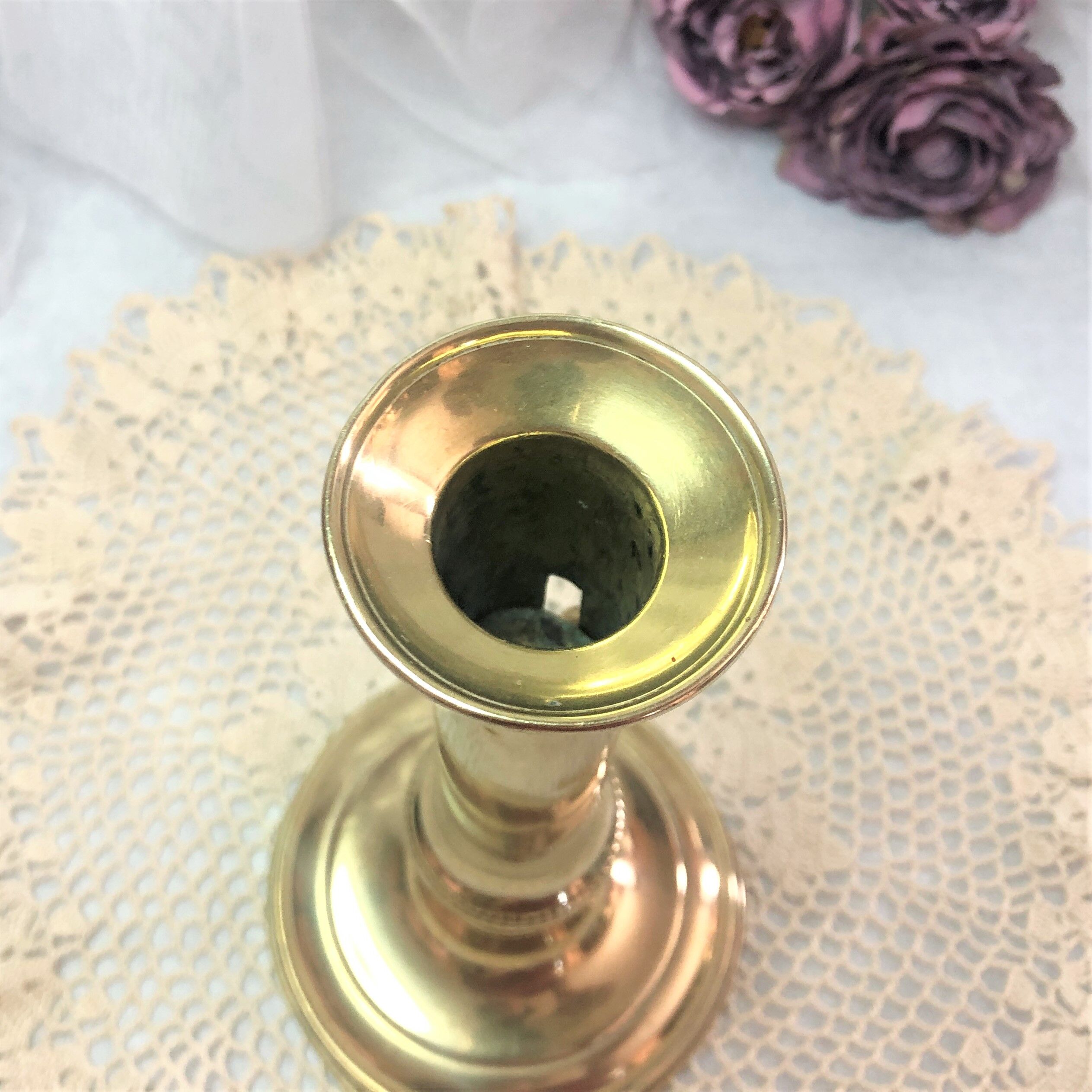 Gilded copper push candle holder