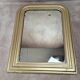 Antique Louis-Philippe style gilded patinated mirror