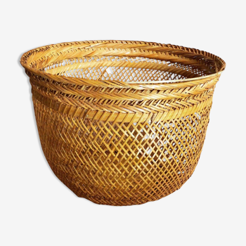 Openwork braided rattan basket