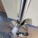 Vintage tripod lamp base in chrome metal