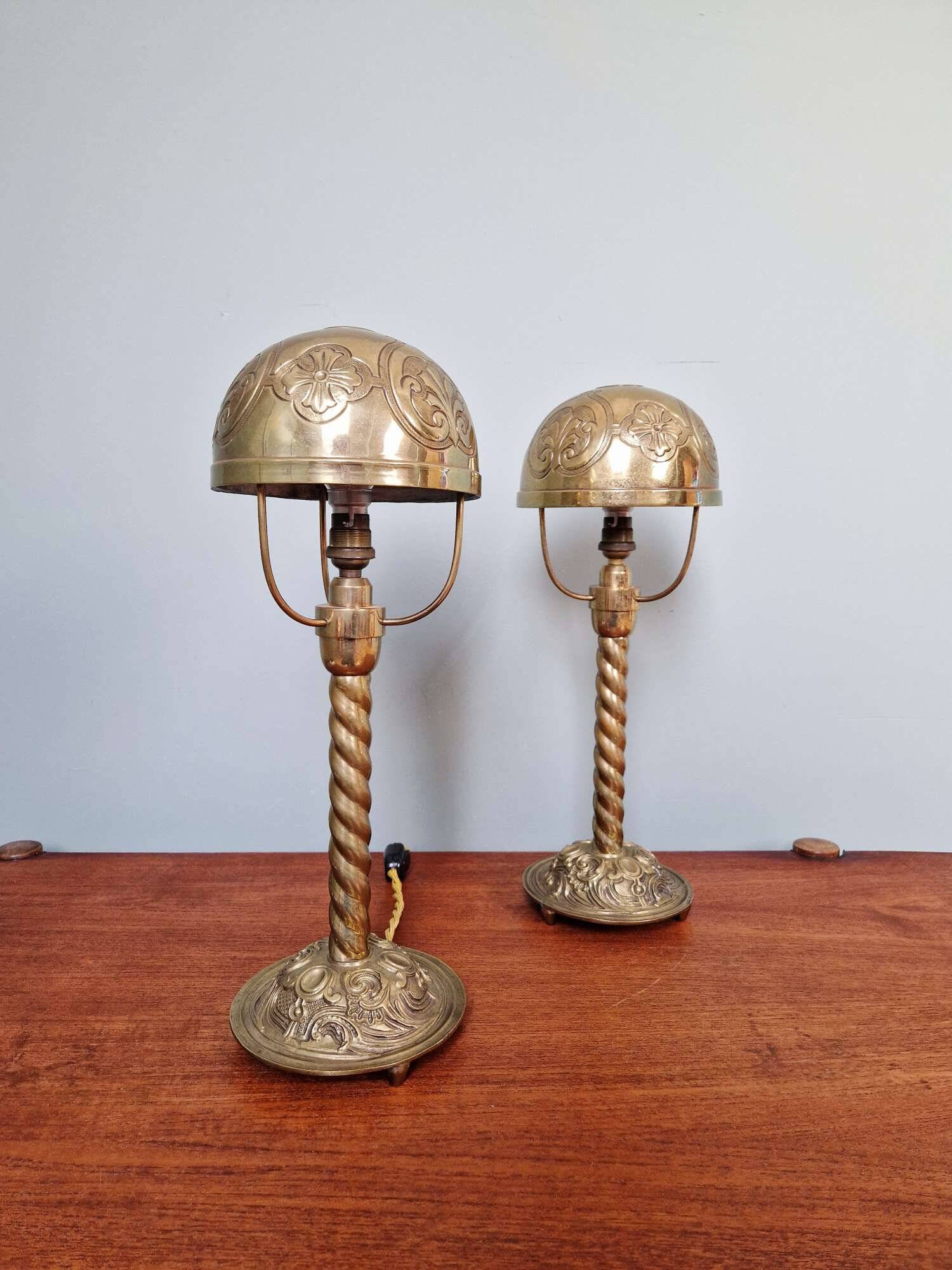 Pair of bronze and brass table lamps, early 20th century
