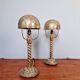 Pair of bronze and brass table lamps, early 20th century